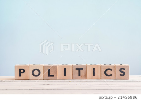 Politics sign made of wooden cubes Politics sign made of wooden cubes 21456986