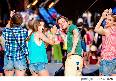 Teenagers at summer music festival clapping and Teenagers at summer music festival clapping and 21461026
