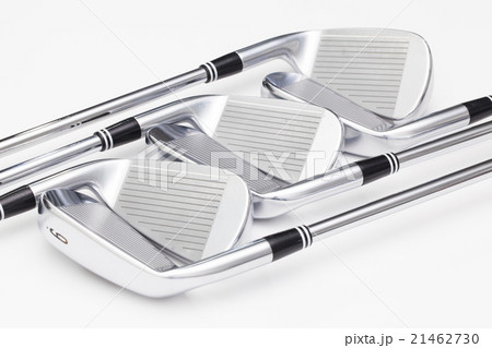 Titanium golf clubs on the white table Titanium golf clubs on the white table 21462730
