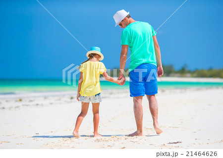Little girl and young father during tropical beach Little girl and young father during tropical beach 21464626