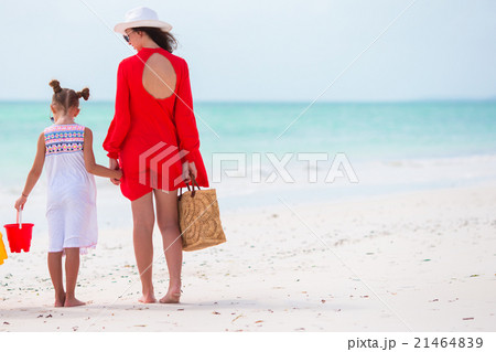 Mother and little girl during tropical vacation Mother and little girl during tropical vacation 21464839