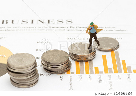 businessman on coins,finance and business concept businessman on coins,finance and business concept 21466234