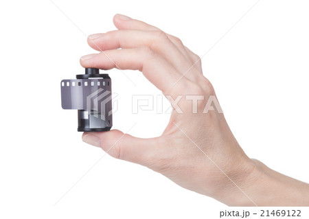 female hand holding a film for the camera 21469122