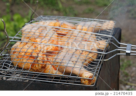 Roast chicken on grill 21470435