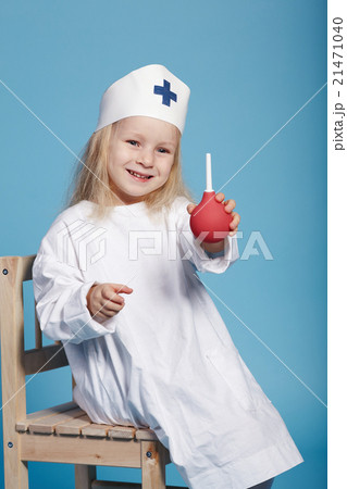 little funny girl playing nurse 21471040