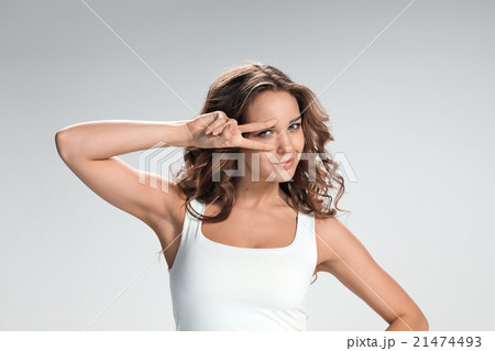 The young woman's portrait with funny emotions 21474493