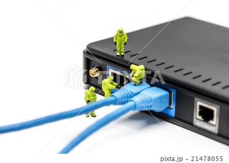 Network engineers connecting cables Network engineers connecting cables 21478055