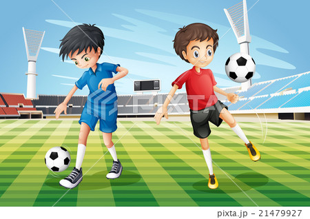 Boys playing soccer in the field 21479927
