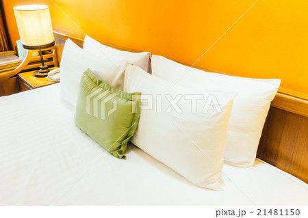Pillow on bed with light lamp Pillow on bed with light lamp 21481150