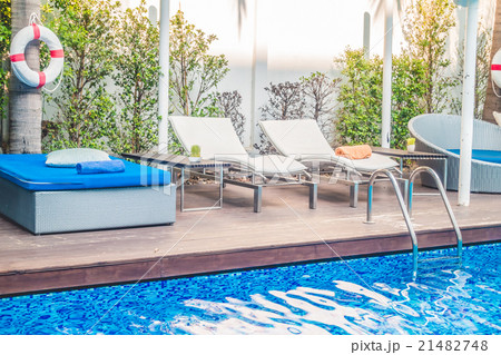 Umbrella pool and chair Umbrella pool and chair 21482748