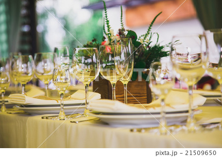 Many empty wine glasses on festive table 21509650
