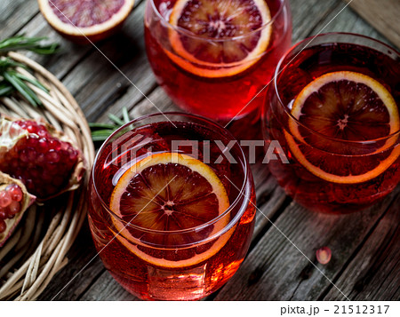 Blood orange and pomegranate cocktails 21512317