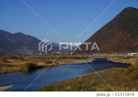千曲川と春の白馬連峰（長野県埴科郡坂城町） 21515676