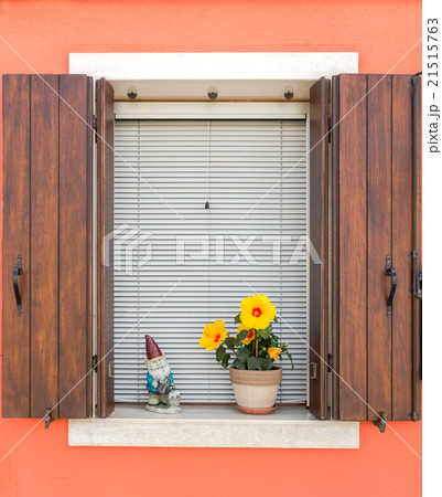 Venice. A window with shutters on the background 21515763