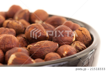 Hazelnuts in a bowl Hazelnuts in a bowl 21518333