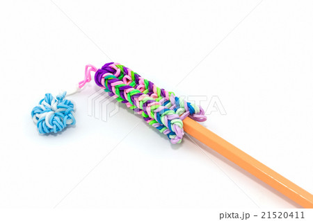 Colorful elastic rainbow loom bands with pencil. 21520411