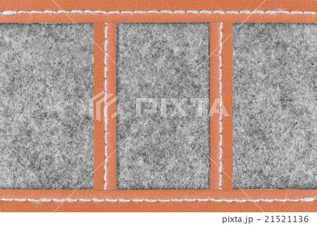 Gray fabric and brown leather background 21521136