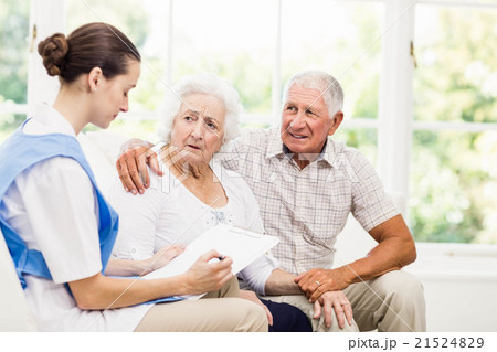 Nurse taking care of sick elderly patients Nurse taking care of sick elderly patients 21524829