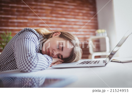 Tired hipster businesswoman sleeping Tired hipster businesswoman sleeping 21524955