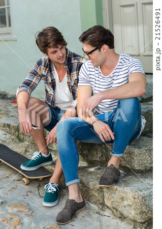 Hip men sitting on steps Hip men sitting on steps 21526491