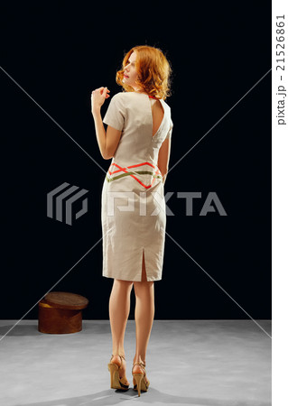 red hair model posing in fashion dress 21526861