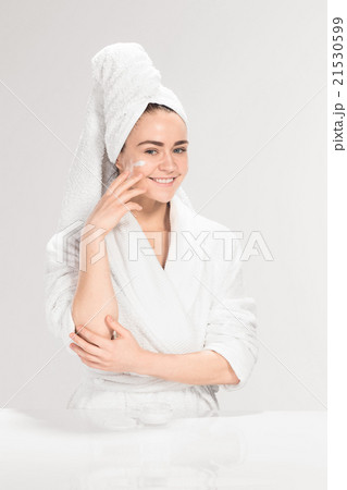 Cute nice girl with cream in her face 21530599