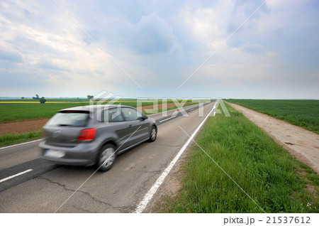 speed auto asphalt road through the green field  speed auto asphalt road through the green field  21537612