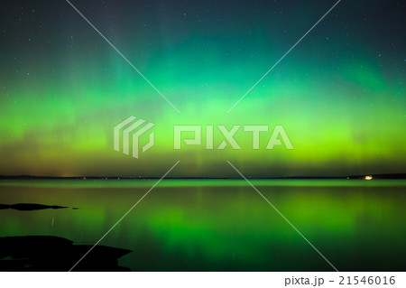 Northern lights over lake in finland Northern lights over lake in finland 21546016