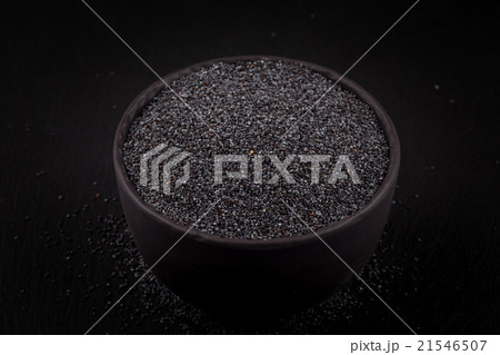 poppy seeds in a stone bowl poppy seeds in a stone bowl 21546507