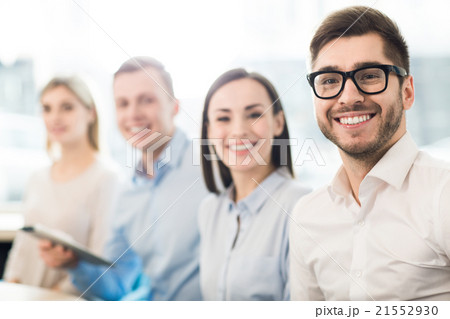Cheerful colleagues  smiling 21552930