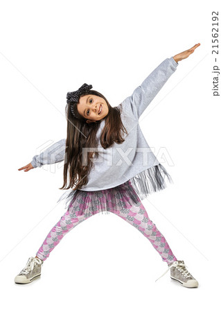Little brunette girl in fashionable dress posing Little brunette girl in fashionable dress posing 21562192