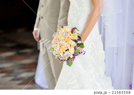 beautiful wedding bouquet at bride's hands beautiful wedding bouquet at bride's hands 21563508