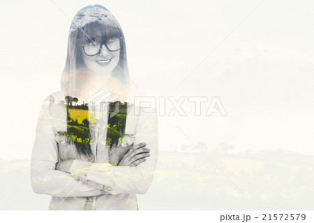 Composite image of portrait of a smiling hipster woman  21572579