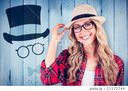 Composite image of gorgeous smiling blonde hipster posing Composite image of gorgeous smiling blonde hipster posing 21572744