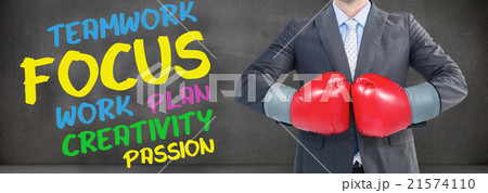 Composite image of businessman with boxing gloves Composite image of businessman with boxing gloves 21574110
