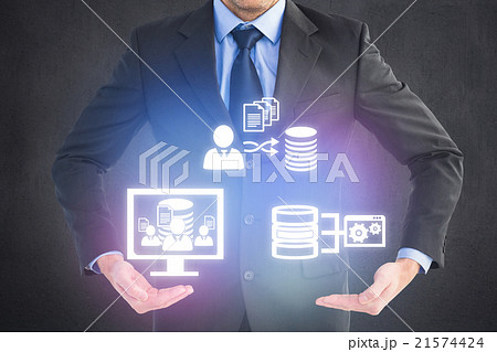 Composite image of businessman holding something with his hands Composite image of businessman holding something with his hands 21574424
