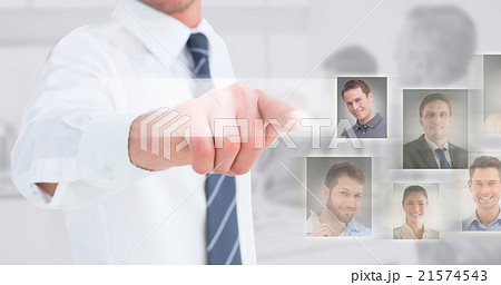 Composite image of businessman in shirt presenting at camera 21574543