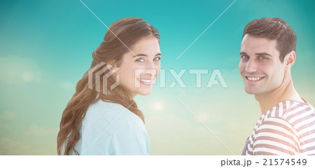 Composite image of couple looking at camera 21574549