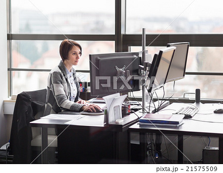 Business woman working in corporate office. Business woman working in corporate office. 21575509