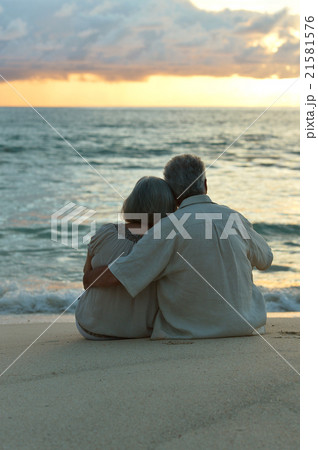 elderly couple rest at tropical beach elderly couple rest at tropical beach 21581576