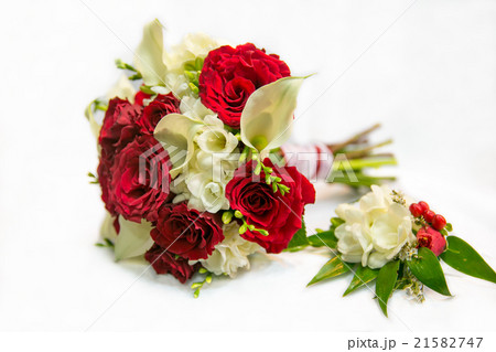 Wedding bouquet with red roses and a buttonhole Wedding bouquet with red roses and a buttonhole 21582747