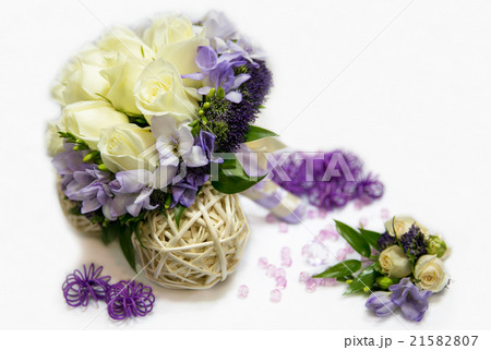 A wedding bouquet with lilac flowers, a buttonhole A wedding bouquet with lilac flowers, a buttonhole 21582807