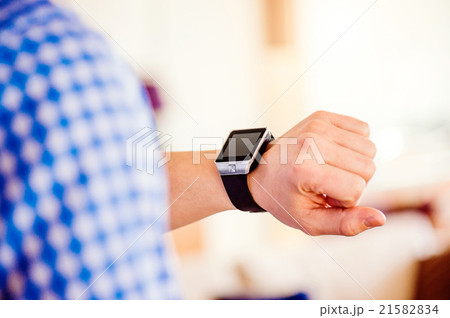 Close up of unrecognizable man using smart watch 21582834