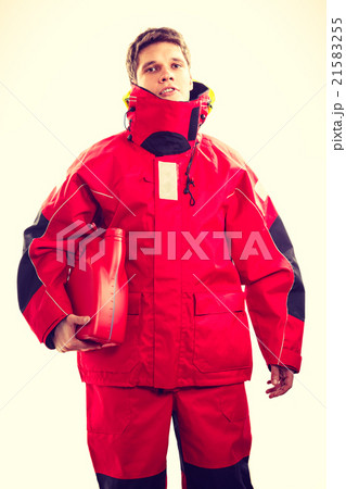 Man in oilskin with bottle. Man in oilskin with bottle. 21583255