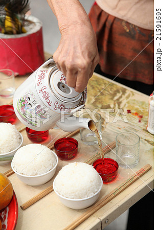 Tea pouring ancestor food offering 21591695