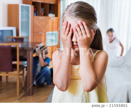 Joyful children hiding from girl with closed 21593801