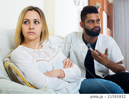 Offended black guy having bad fight with girlfriend and shouting 21593932