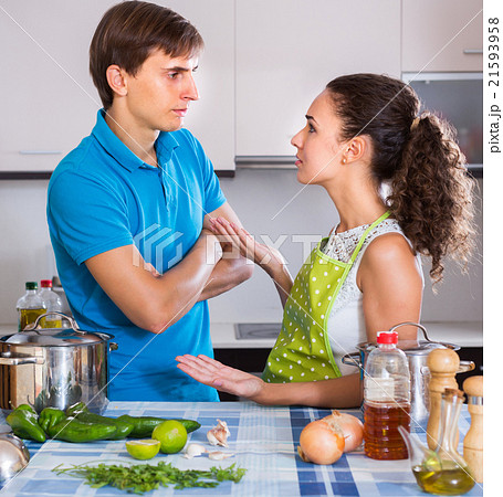 Unhappy woman quarrelling with offended man 21593958