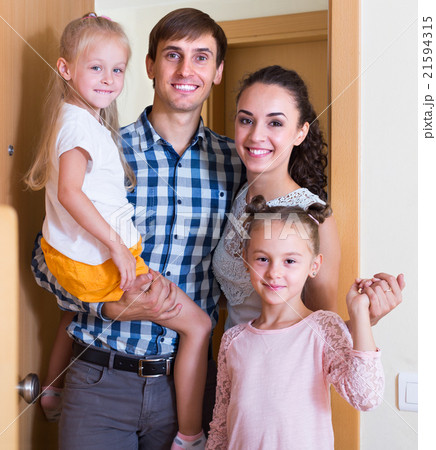 family standing at doorway family standing at doorway 21594315