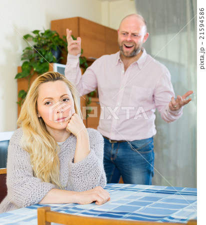 Couple having quarrel indoor 21594586